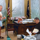 Joe Biden, 67, helps Obama sort through personal documents in the remains of his home office.